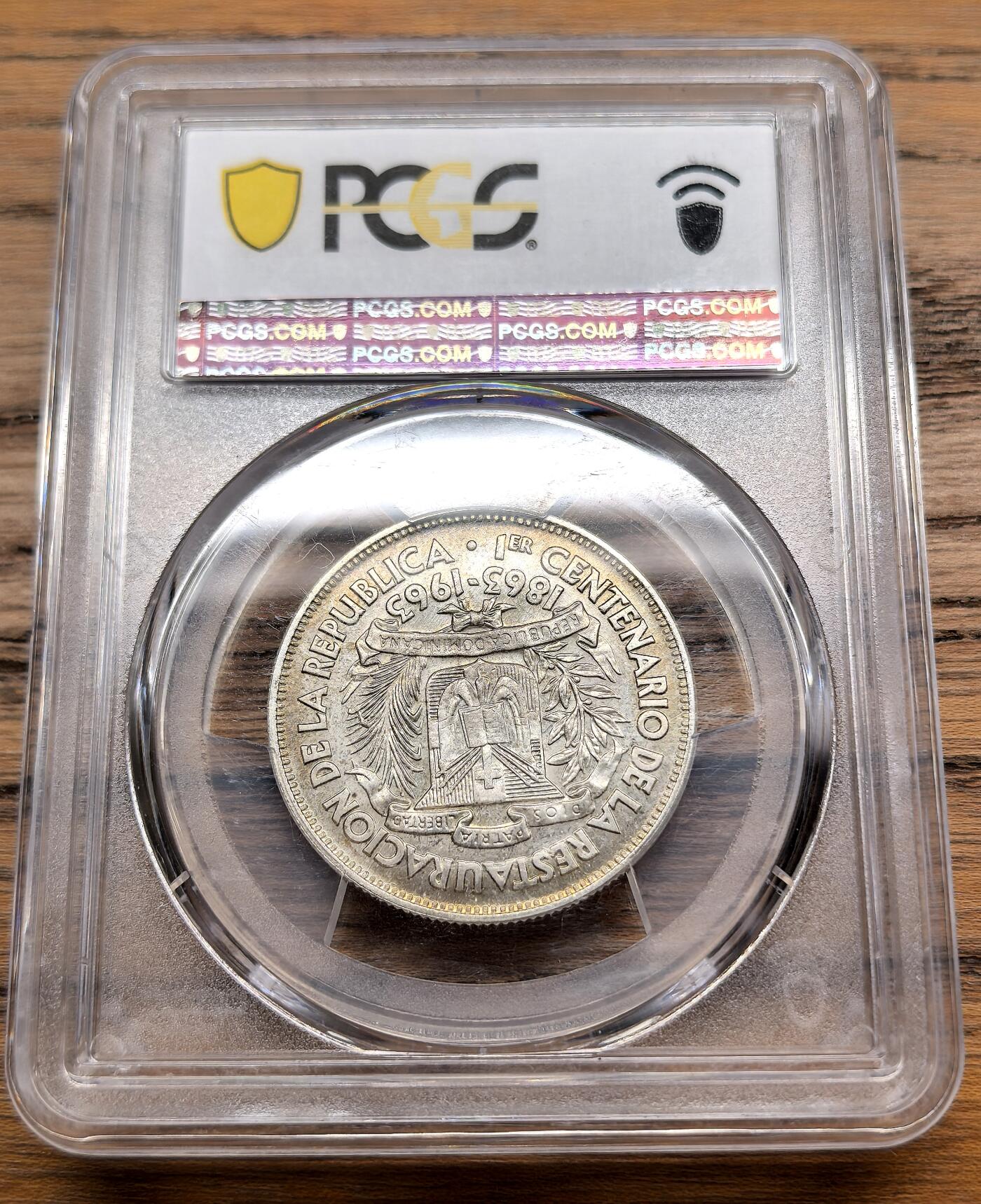 凡希社世界钱币微拍第三百零九期 1963多米尼加共和国的恢复纪念1/2比索银币PCGS-SP66，King's Norton留厂样币。