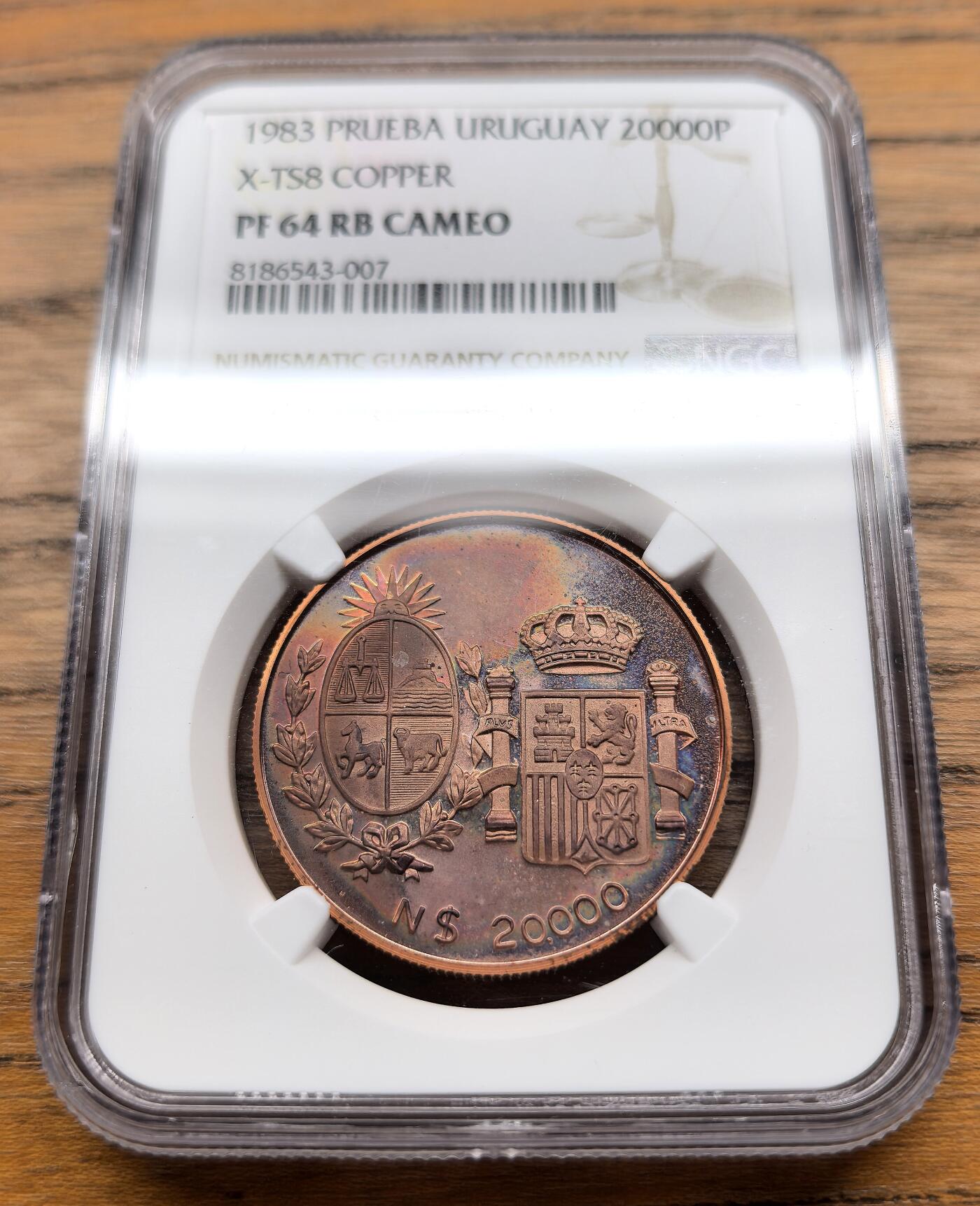 凡希社世界钱币微拍第三百零九期 1983乌拉圭与西班牙友谊纪念20000比索铜样币NGC-PR64