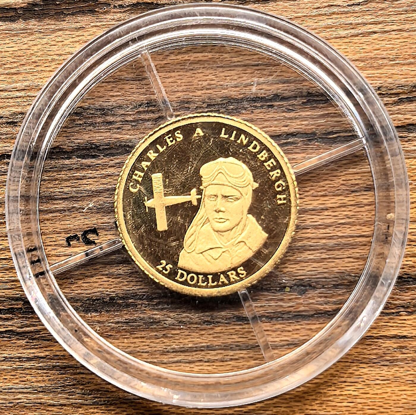 凡希社世界钱币微拍第三百零九期 2001利比里亚林德伯格25元小金币全品，0.72g，999金