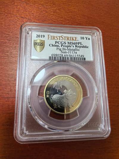 长老汇蛇年精选第三十六场拍卖 - 2019中国猪年10元双金属类精制币，PCGS MS69PL，首日标