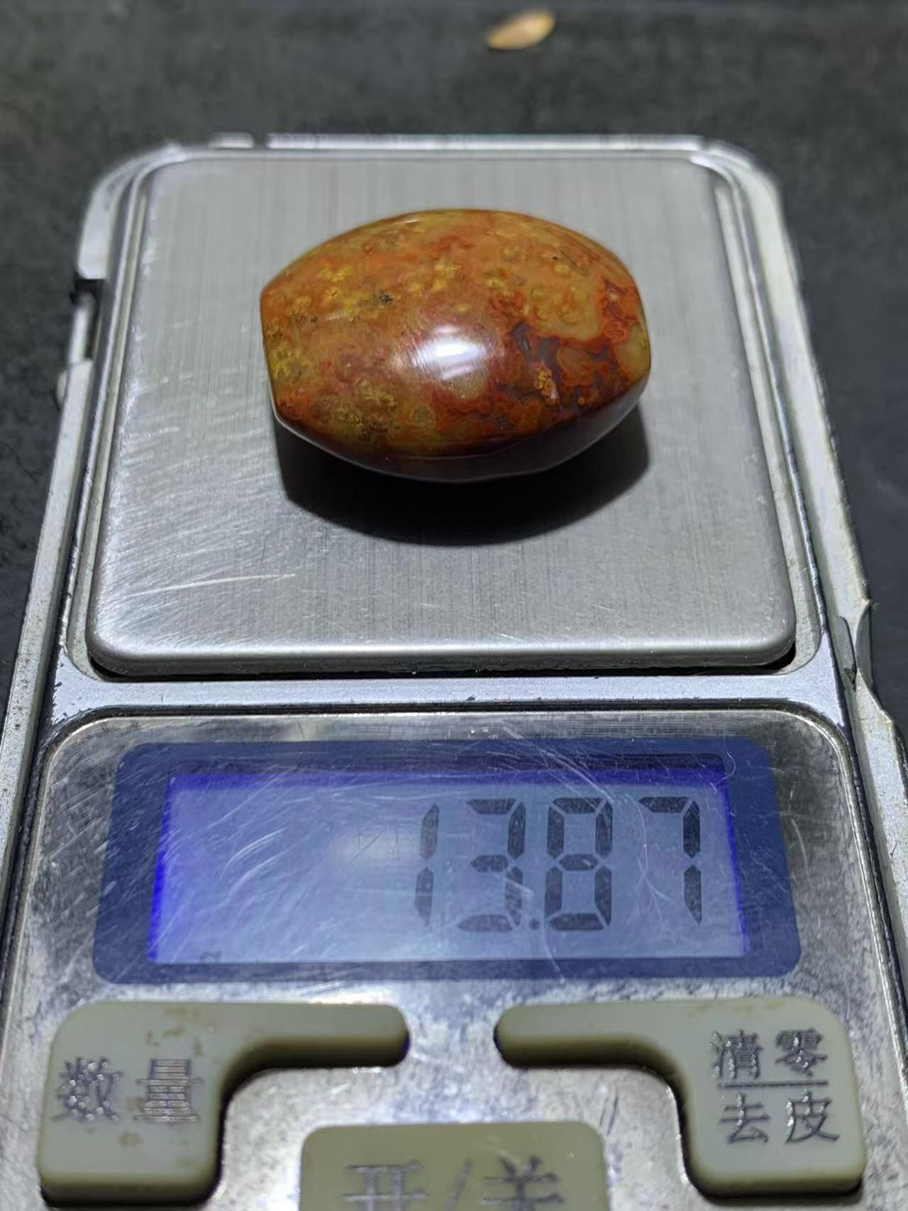 精美草花纹飘紫罗兰战国红玛瑙随形勒子一颗