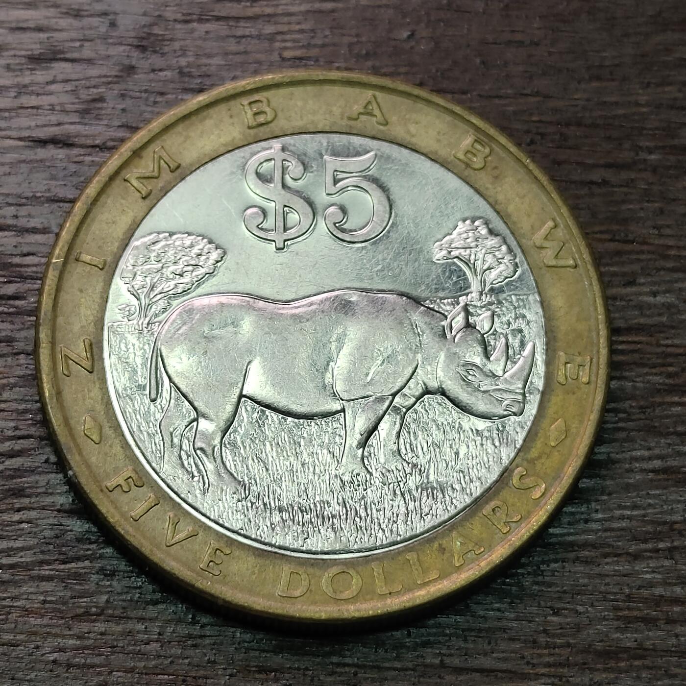 【铜匠收藏】★第126场★散币场，无佣金，30包邮。不满30元，支付5元运费。《接受代拍 代送NGC评级》 津巴布韦 2001年 5元 双色金属币 犀牛 座山雕