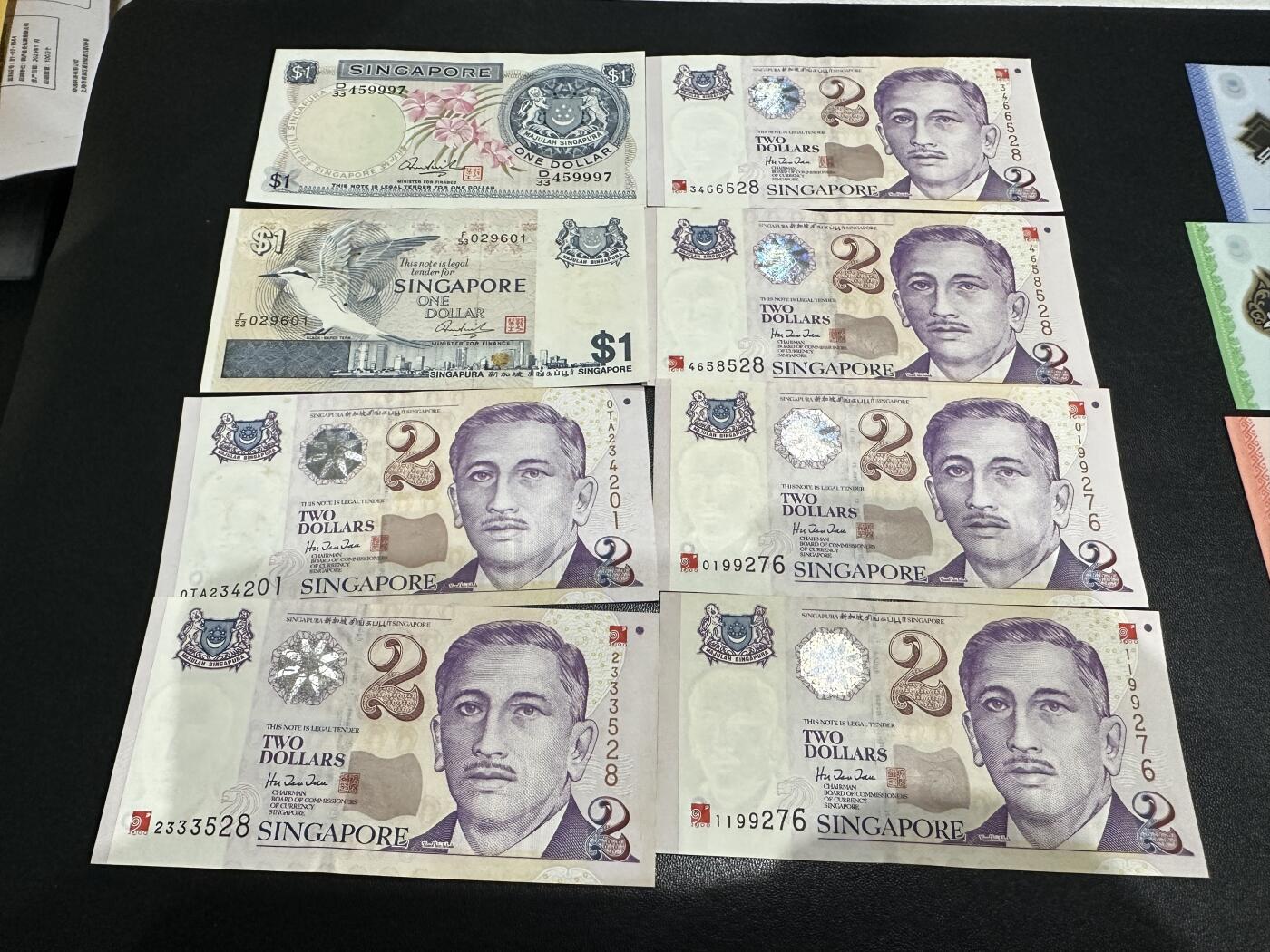 《外钞收藏家》第五百五十七期（本期有精品评级、获奖钞等品种）（本平台长期征集拍品、欢迎藏友们联系合作） 新加坡2000年千禧年2元纪念钞5张+花版1元+鸟版1元+99年2元胡赐道签名（号码不错）	9品以上
