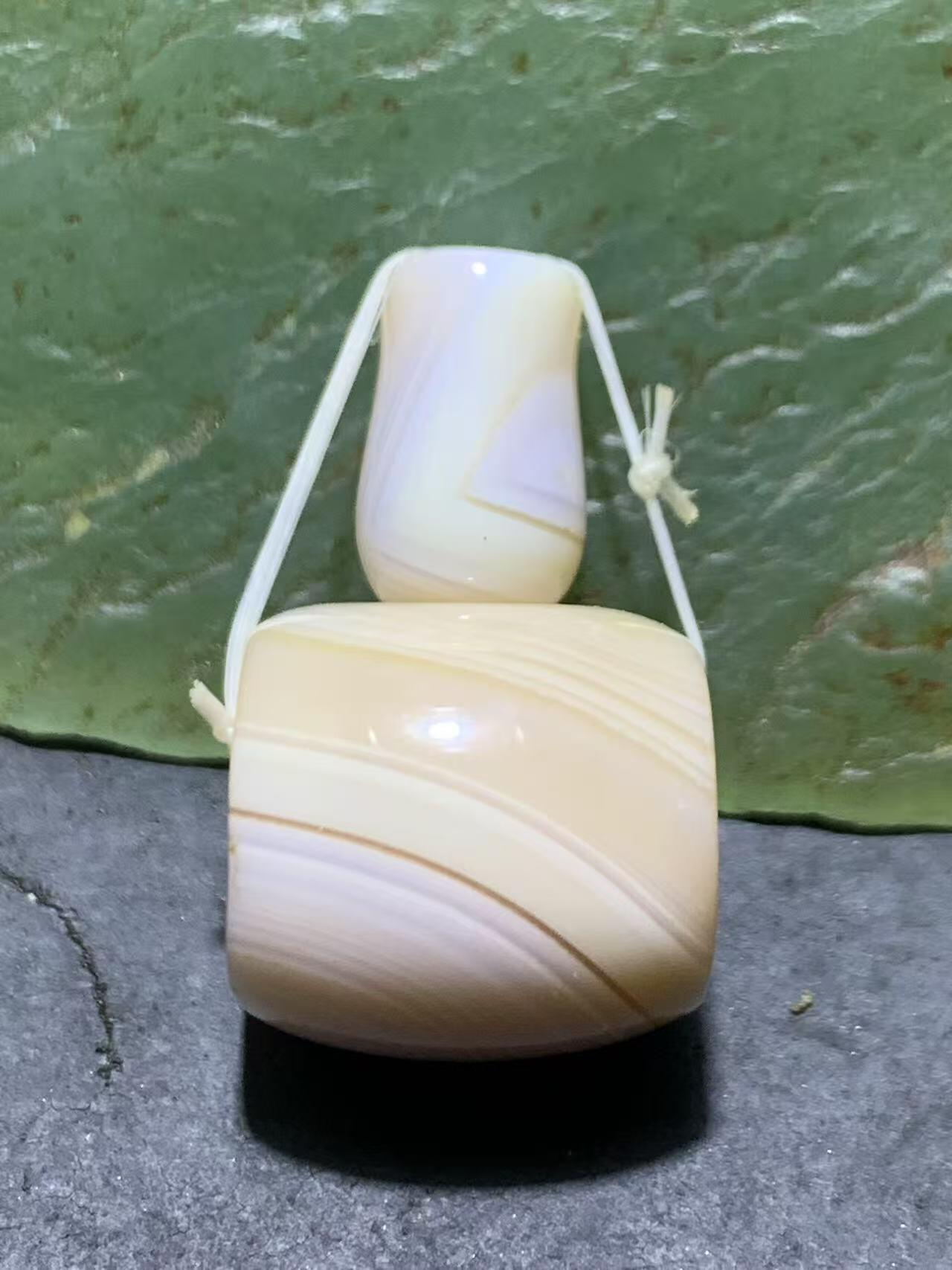 通货高玉化缠丝玛瑙佛头三通一套，