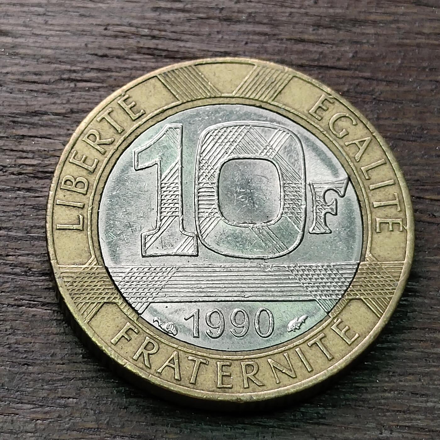 【铜匠收藏】★第128场★散币场，无佣金，30包邮。不满30元，支付5元运费。《接受代拍 代送NGC评级》 法国 1990年 10法郎 小天使 双色币