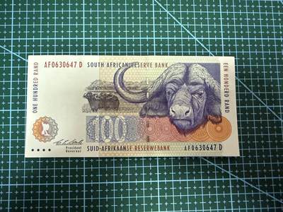 【炜奕收藏】，第四十一期 - 1994年南非100兰特，UNC-品相，有针孔，初版签名