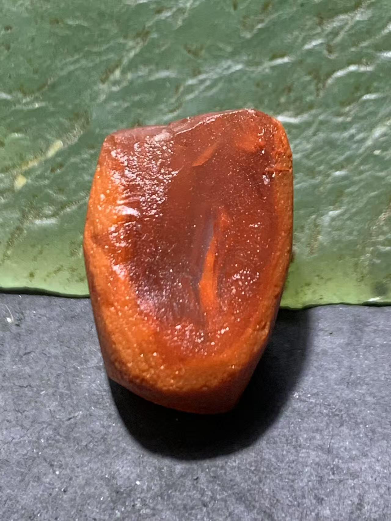 精美冰飘柿子红南红玛瑙明料原石一颗