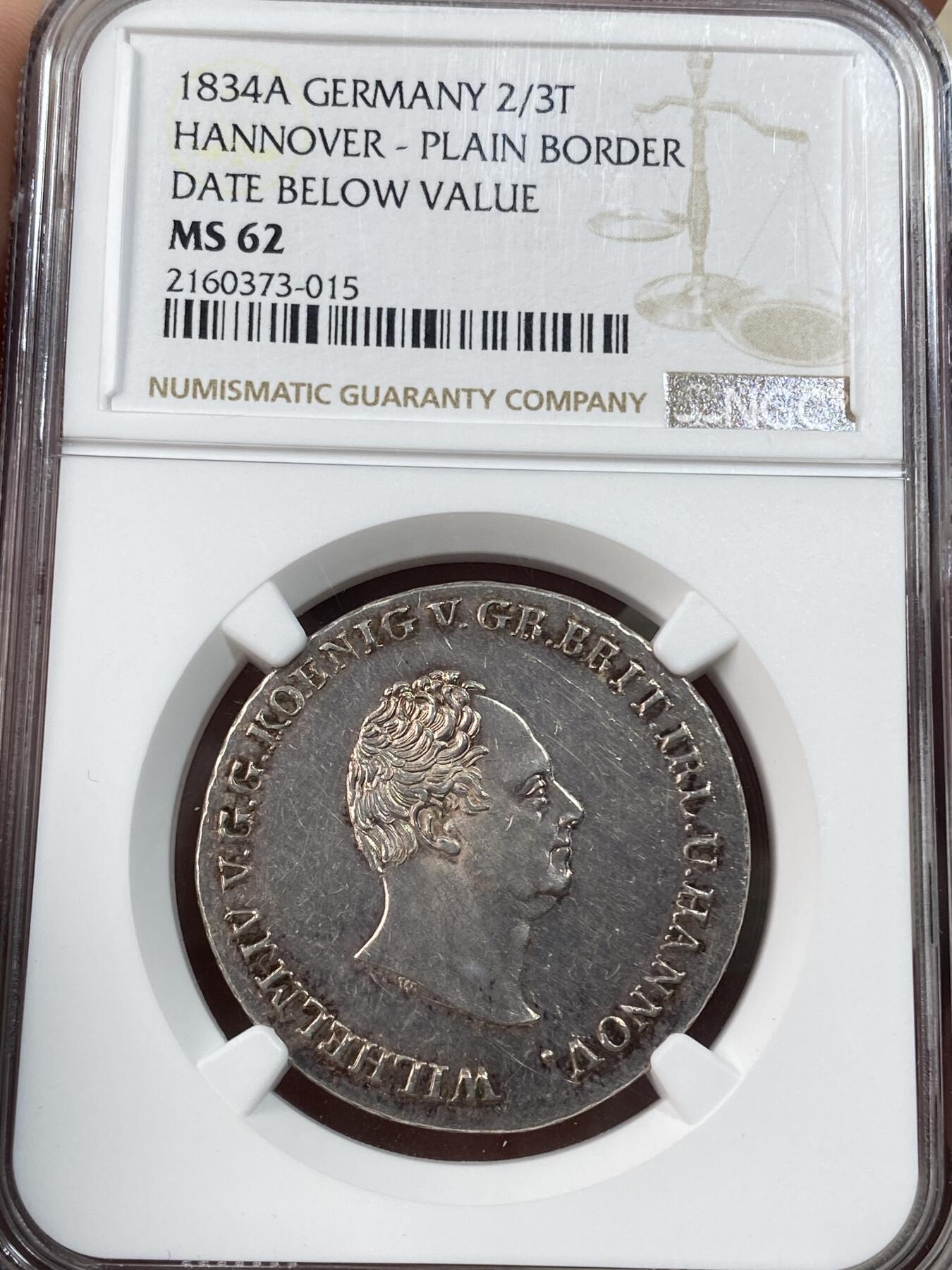 万国钱币拍卖第051期 NGC MS62 1834年德国汉诺威威廉四世英式盾徽流通2/3泰勒 欧陆五彩全深打难得