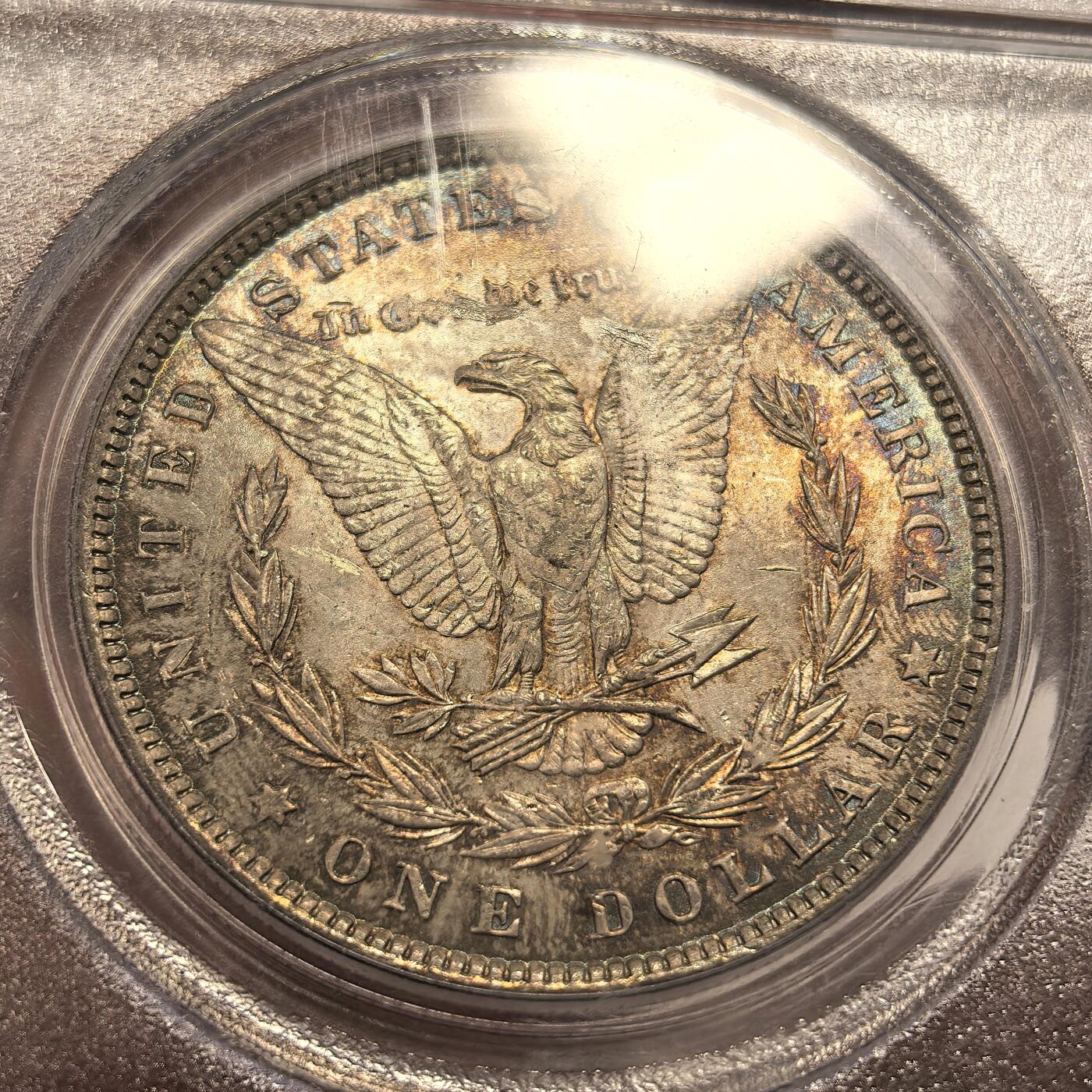 博洋堂世界钱币拍卖第135期（全场包邮）【请留意本场发货时间变化】 美国1881年摩根银币P版PCGS-MS63，原汁原味双面五彩老包浆，包浆醇厚，打制精美，转光强烈细节优秀，市场上比较稀少年份版本的摩根币，通常市场上常见的1881年是S版，几乎很少见到这个年份的P版。