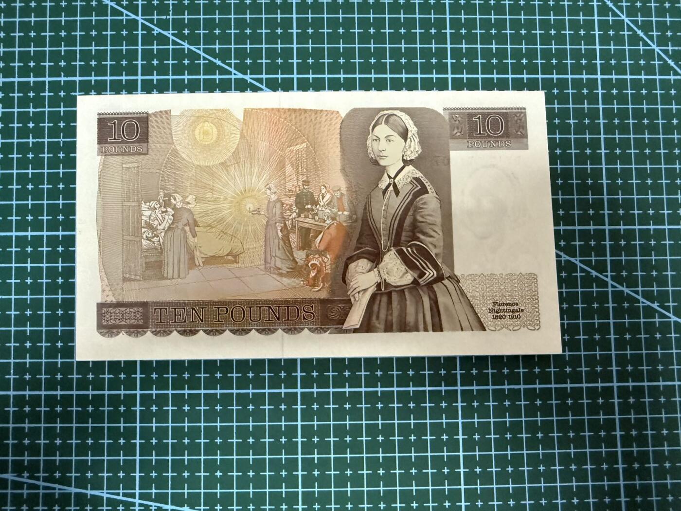 【炜奕收藏】，第四十一期 英国D序列10镑，AU品相