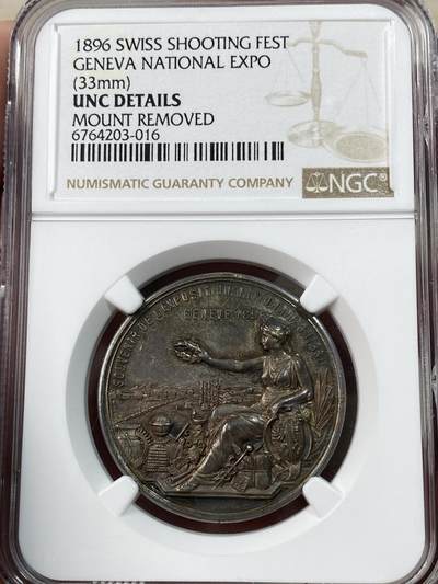 万国钱币拍卖第051期 - NGC UNCD 1896年瑞士日内瓦国家博览会联合会纪念银章 双面均匀欧陆五彩包浆 城市景观与城市女神高浮雕状态极赞 顶部去除原有吊环 其他无任何毛病
