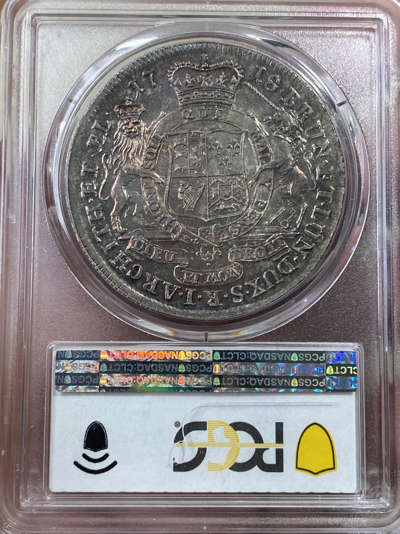 万国钱币拍卖第051期 NGC MS64 1718布伦瑞克-吕纳堡-汉诺威狮马盾徽大泰勒 极其罕见的一枚英系泰勒 正面君主为汉诺威选帝侯同时也是英国汉诺威王朝的第一位国王乔治一世 而这位英语不太流利的国王只能任命大臣替他处理政务 由此也成为了英国首相一职的开端 经典汉诺威狮马纹章 极其绚丽的欧陆五彩 一枚英德双修的顶级藏品 PC唯一冠军分