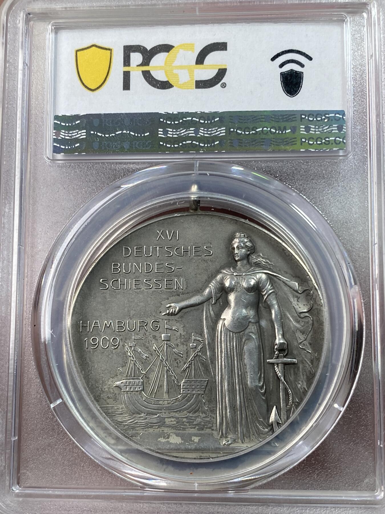万国钱币拍卖第051期 PCGS MS63 1909年德国汉堡射击节纪念大银章 原味浮雕德系铁甲舰与女神组合罕见