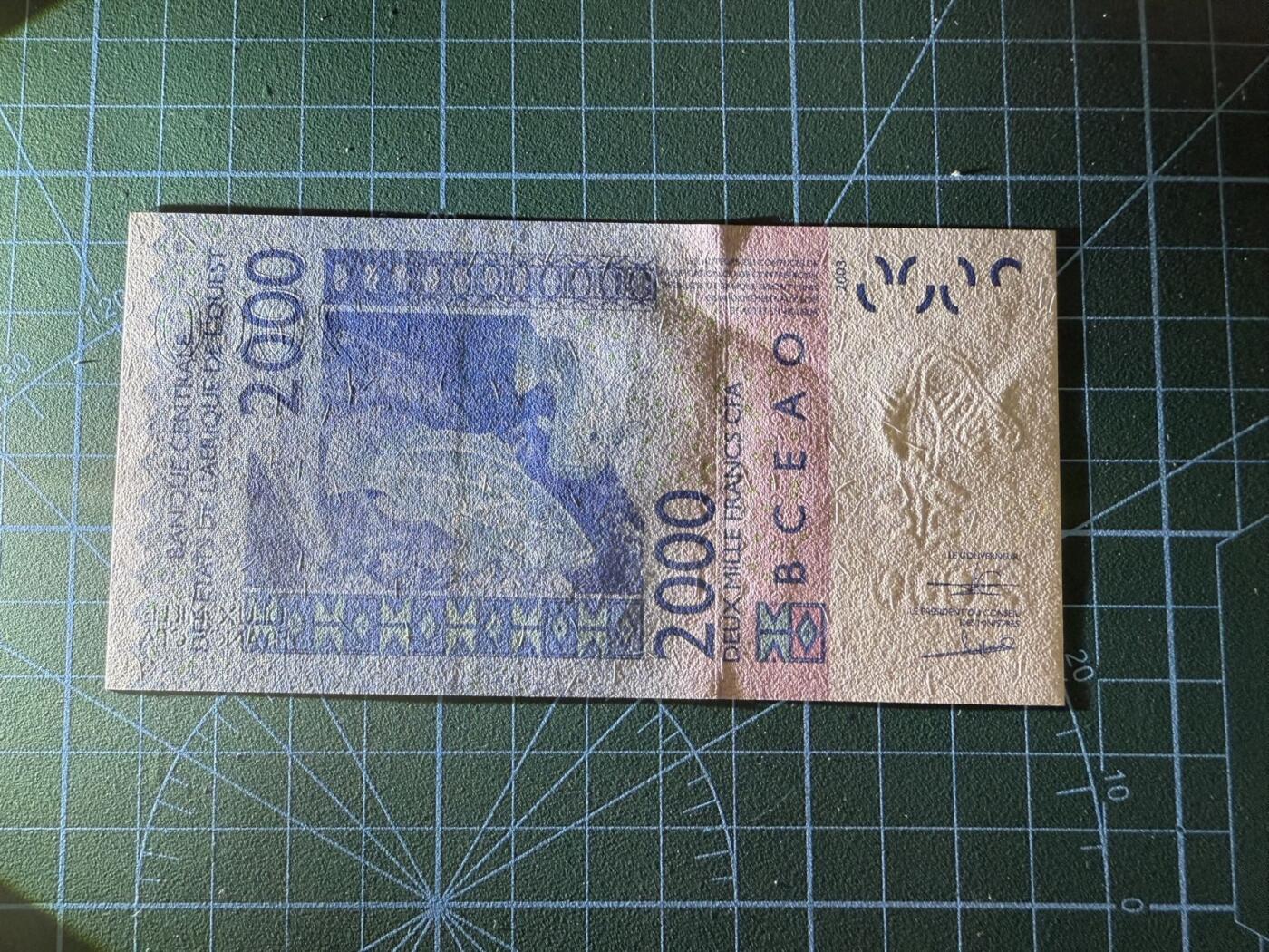【炜奕收藏】，第四十一期 2003年西非尼日尔（字母H）2000法郎，UNC品相