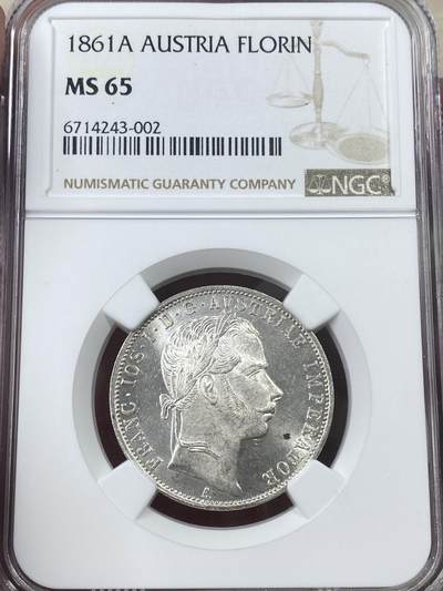 万国钱币拍卖第051期 - NGC MS65 1861奥地利弗朗茨一世双头鹰弗洛林银币 类镜面喷砂质感 BU收藏品质