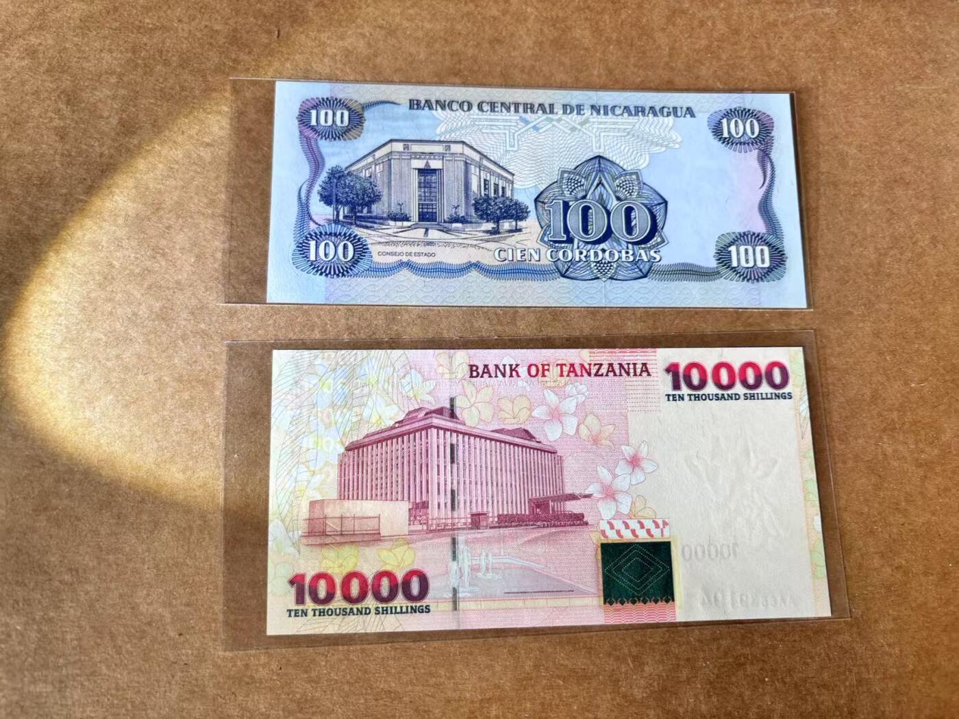【Blue Auction】世界纸币精拍第711期——18级TOP拍卖/信誉/品质/专业/高效💫 【一组2张 含AA冠】坦桑尼亚10000先令&尼加拉瓜 1985年100科多巴 全新UNC