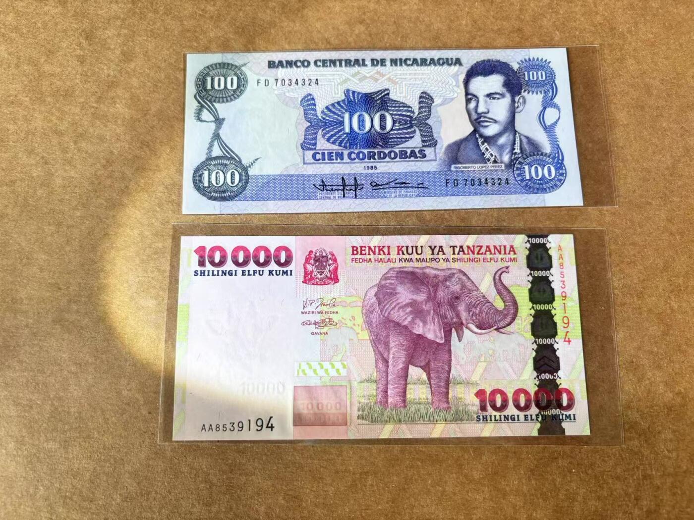 【Blue Auction】世界纸币精拍第711期——18级TOP拍卖/信誉/品质/专业/高效💫 【一组2张 含AA冠】坦桑尼亚10000先令&尼加拉瓜 1985年100科多巴 全新UNC