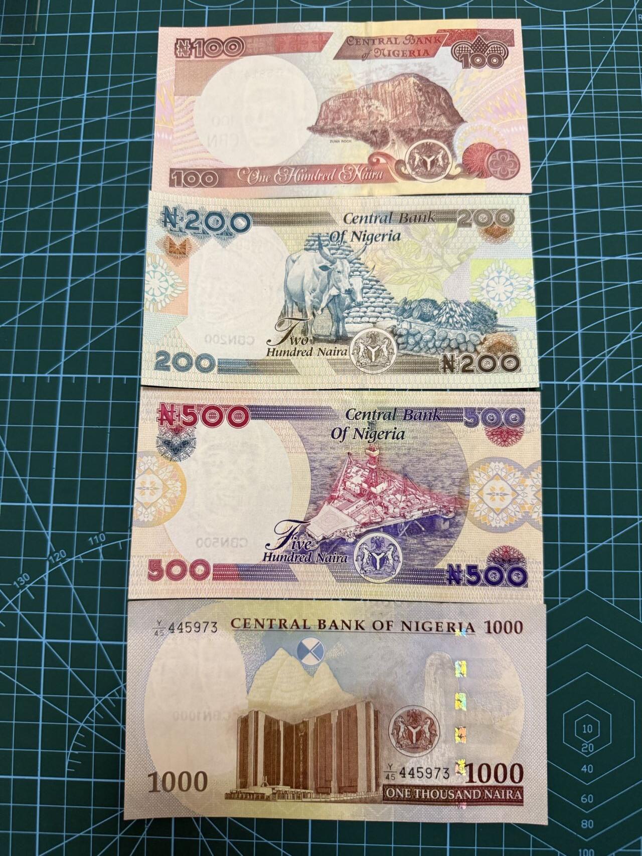 【炜奕收藏】，第四十一期 尼日利亚100-1000奈拉，UNC-/UNC品相，部分有轻微压痕