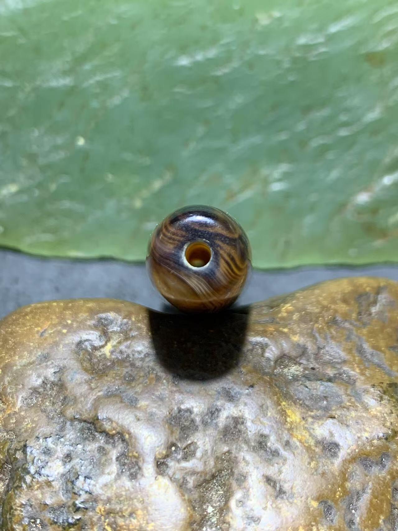 精美罕见象形无相佛药师玛瑙桶珠一个！