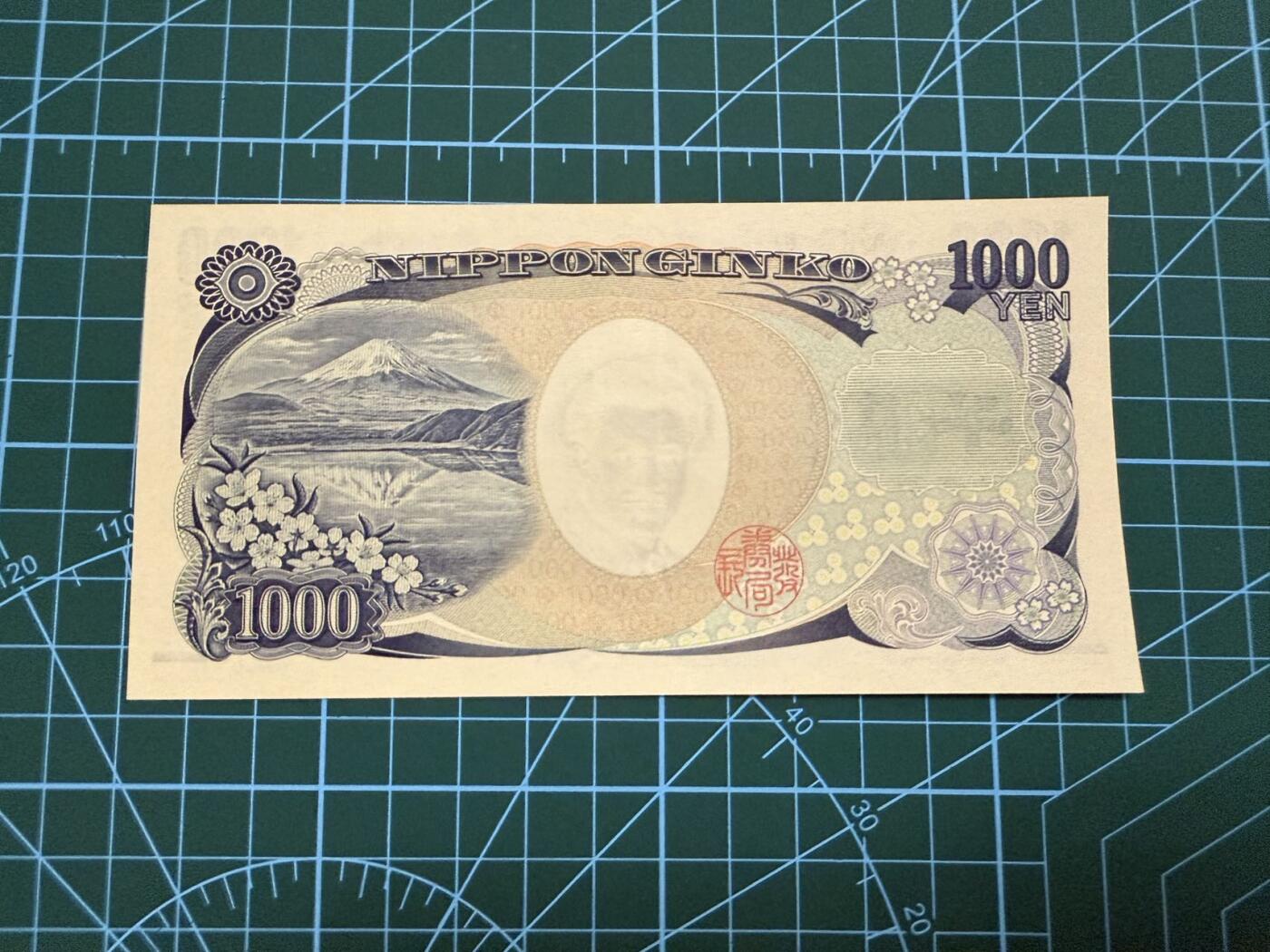 【炜奕收藏】，第四十一期 日本野口英世1000元，UNC品相，蓝色双字轨，号码无47