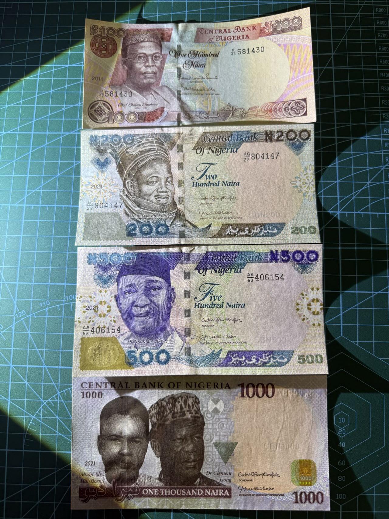【炜奕收藏】，第四十一期 尼日利亚100-1000奈拉，UNC-/UNC品相，部分有轻微压痕