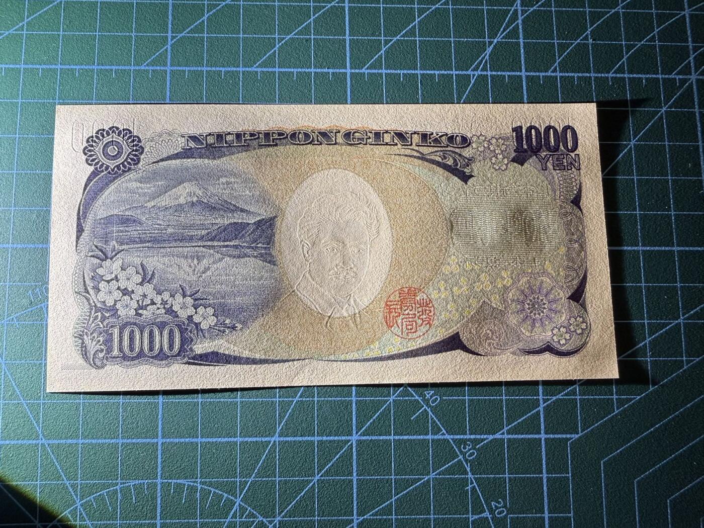 【炜奕收藏】，第四十一期 日本野口英世1000元，UNC品相，蓝色双字轨，号码无47