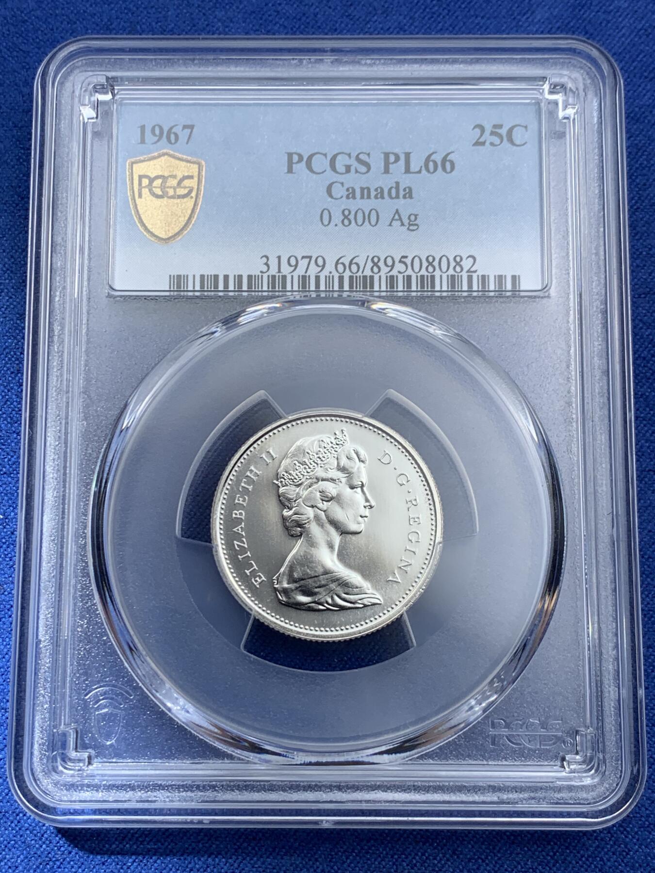 《竞宝斋》第409场 周日，周一，2场连拍 （全场包邮） PCGS PL66 高分 1967年加拿大建国百年纪念25分 非常漂亮的白币 币面光洁 浮雕感很强 豹子图案