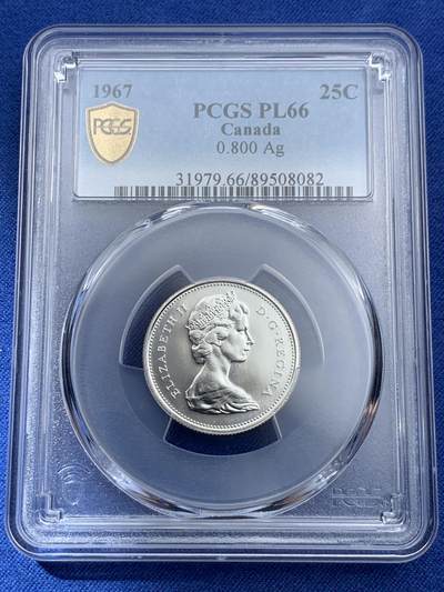 《竞宝斋》第409场 周日，周一，2场连拍 （全场包邮） PCGS PL66 高分 1967年加拿大建国百年纪念25分 非常漂亮的白币 币面光洁 浮雕感很强 豹子图案