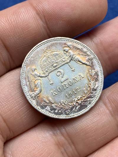 《竞宝斋》第409场 周日，周一，2场连拍 （全场包邮） 奥匈帝国1912年2克朗（匈牙利版），五彩包浆，打制清晰，背面双天使很好看的设计。带转光，AU-UNC之间品相