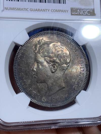 《竞宝斋》第409场 周日，周一，2场连拍 （全场包邮） NGC MS64 西班牙1899年阿方索十三世5比塞塔大银币，正面原味窖藏黑彩，背面杏仁丝滑彩浆，顶级车轮光，打制优异底板佳 一枚入藏的品相