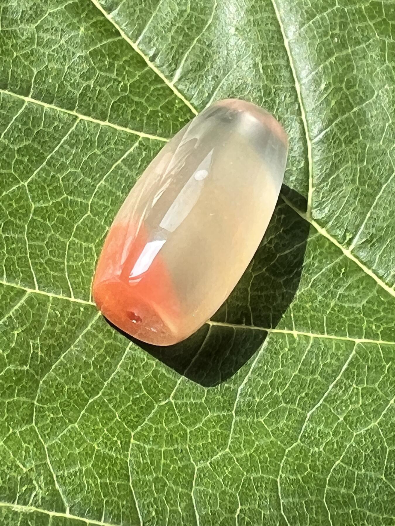 零元拍：南红玛瑙桶珠，约7克，24/18MM，颜色以实物为准。拍到的再送一斤南红鱼缸料，只多不少