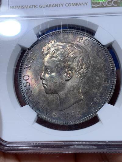 《竞宝斋》第409场 周日，周一，2场连拍 （全场包邮） NGC MS64 西班牙1899年阿方索十三世5比塞塔大银币，正面原味窖藏黑彩，背面杏仁丝滑彩浆，顶级车轮光，打制优异底板佳 一枚入藏的品相