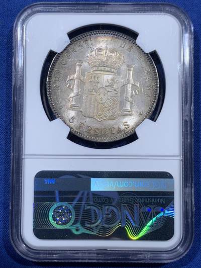 《竞宝斋》第409场 周日，周一，2场连拍 （全场包邮） NGC MS64 西班牙1899年阿方索十三世5比塞塔大银币，正面原味窖藏黑彩，背面杏仁丝滑彩浆，顶级车轮光，打制优异底板佳 一枚入藏的品相