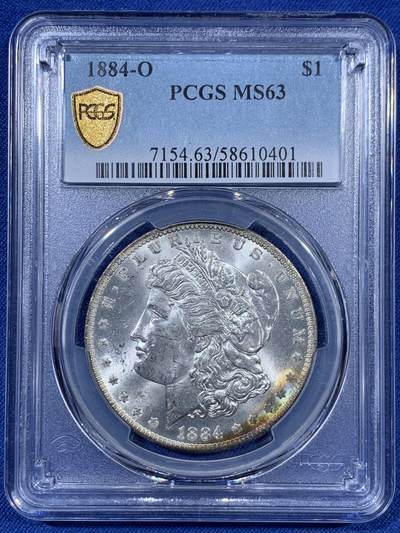 《竞宝斋》第409场 周日，周一，2场连拍 （全场包邮） - PCGS MS63 美国1884-O 摩根银币 小月牙形彩虹包浆