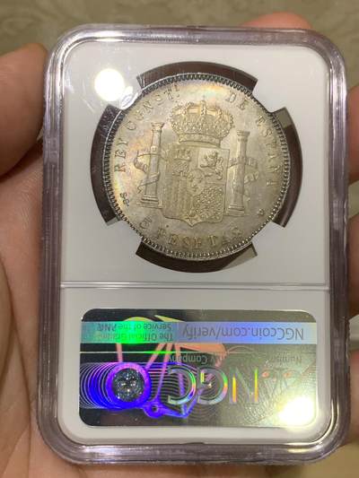 《竞宝斋》第409场 周日，周一，2场连拍 （全场包邮） NGC MS64 西班牙1899年阿方索十三世5比塞塔大银币，正面原味窖藏黑彩，背面杏仁丝滑彩浆，顶级车轮光，打制优异底板佳 一枚入藏的品相