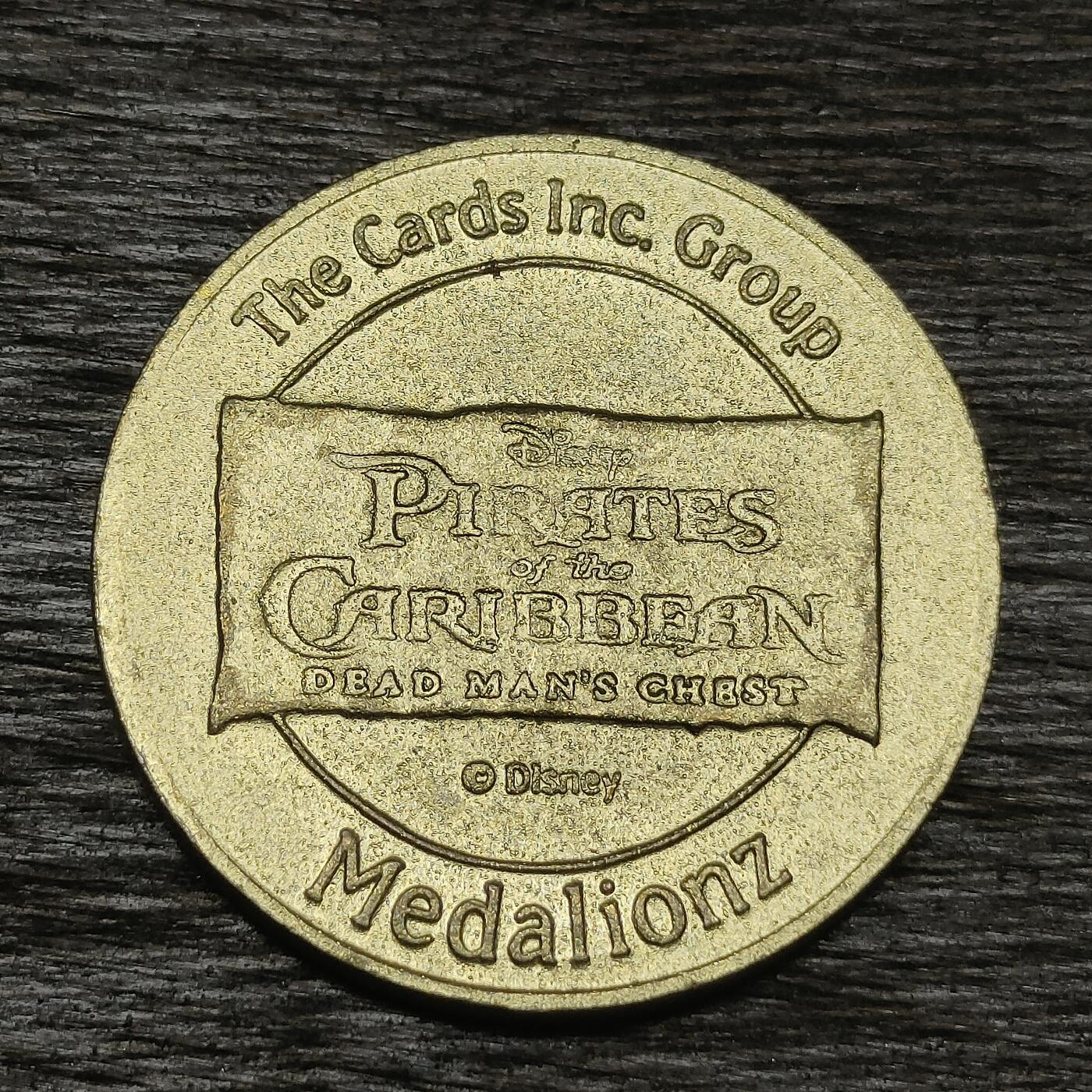 【铜匠收藏】★第130场★散币场，无佣金，30包邮。不满30元，支付5元运费。《接受代拍 代送NGC评级》 迪士尼 加勒比海盗纪念章