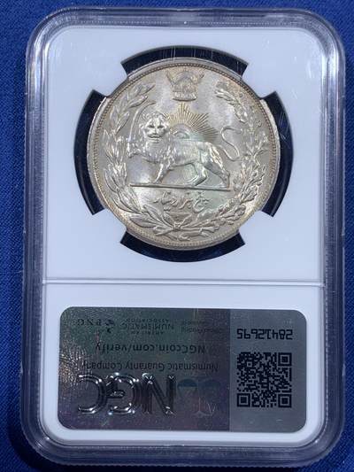 《竞宝斋》第410场 周日，周一，2场连拍 （全场包邮） NGC MS64 伊朗1927年礼萨汗戎装像5000D大银币 列宁格勒厂 细节深打 光度极好 油墨彩包浆 建议重评加分