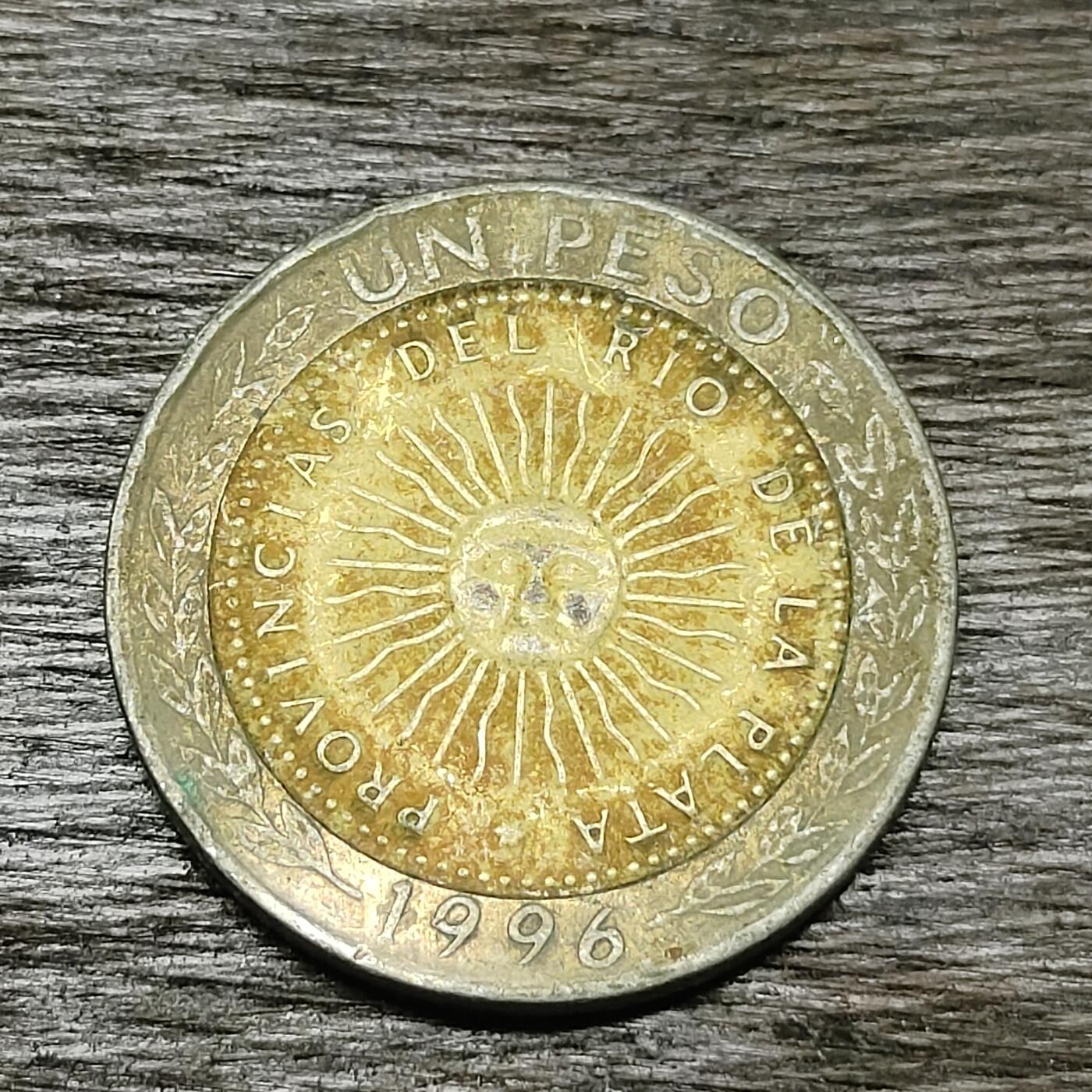 【铜匠收藏】★第130场★散币场，无佣金，30包邮。不满30元，支付5元运费。《接受代拍 代送NGC评级》 阿根廷 1913年 五月太阳 1比索 双色币