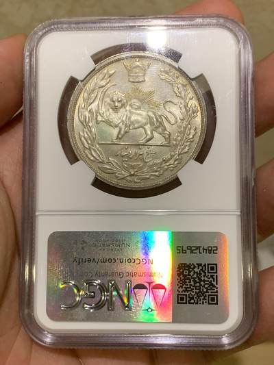 《竞宝斋》第410场 周日，周一，2场连拍 （全场包邮） NGC MS64 伊朗1927年礼萨汗戎装像5000D大银币 列宁格勒厂 细节深打 光度极好 油墨彩包浆 建议重评加分