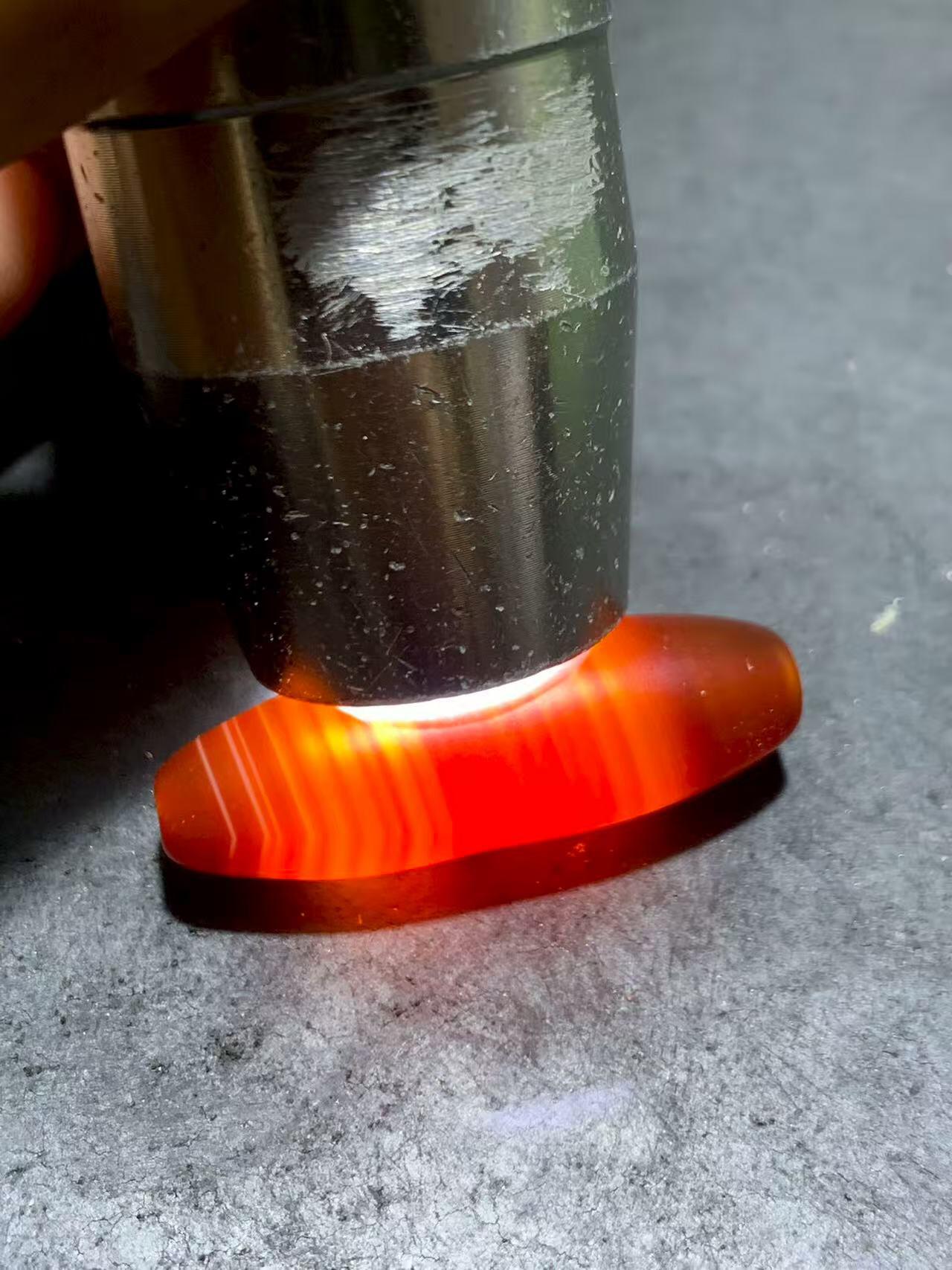 精美高玉化酒红色玛瑙随形通货桶珠一颗