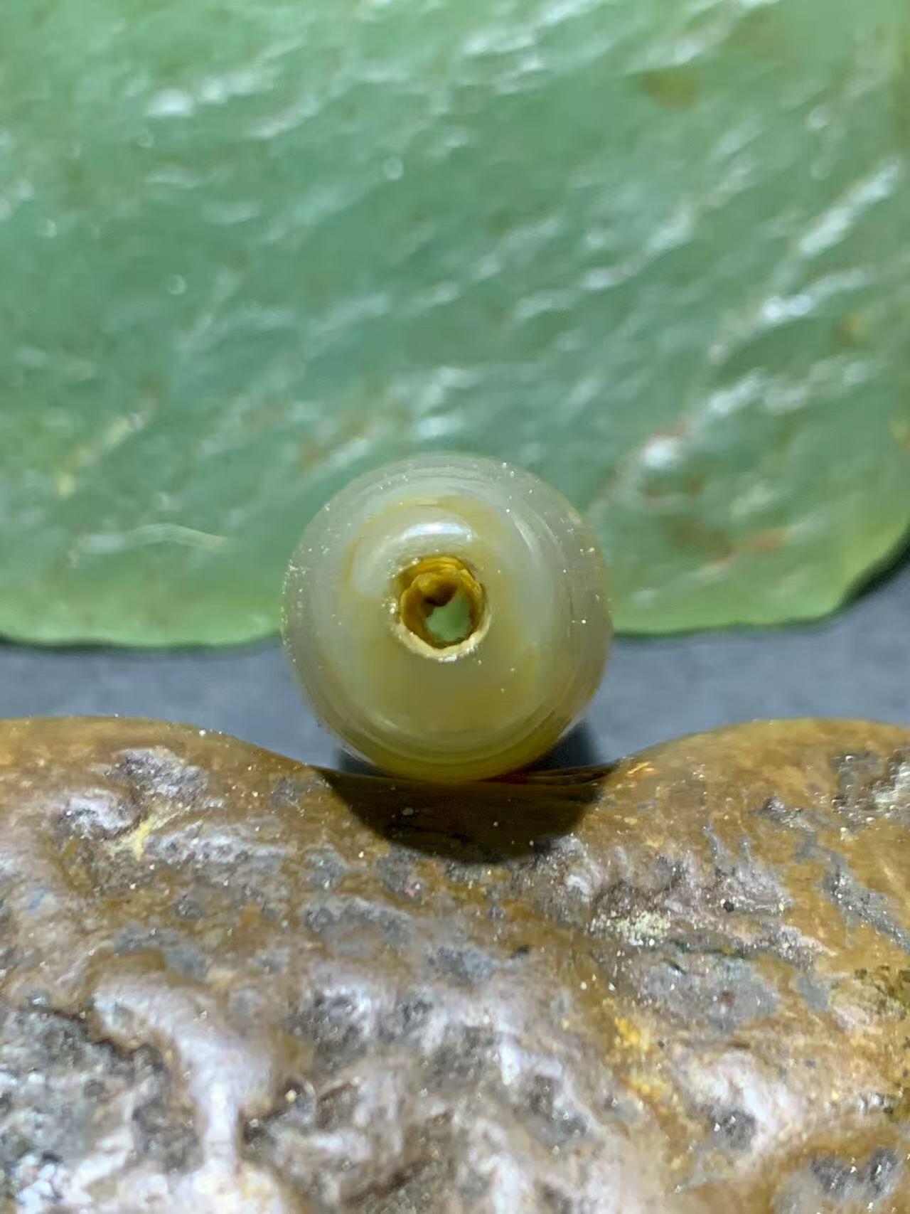 精美高玉化风化纹一线天眼千层纹缠丝玛瑙随形桶珠一颗