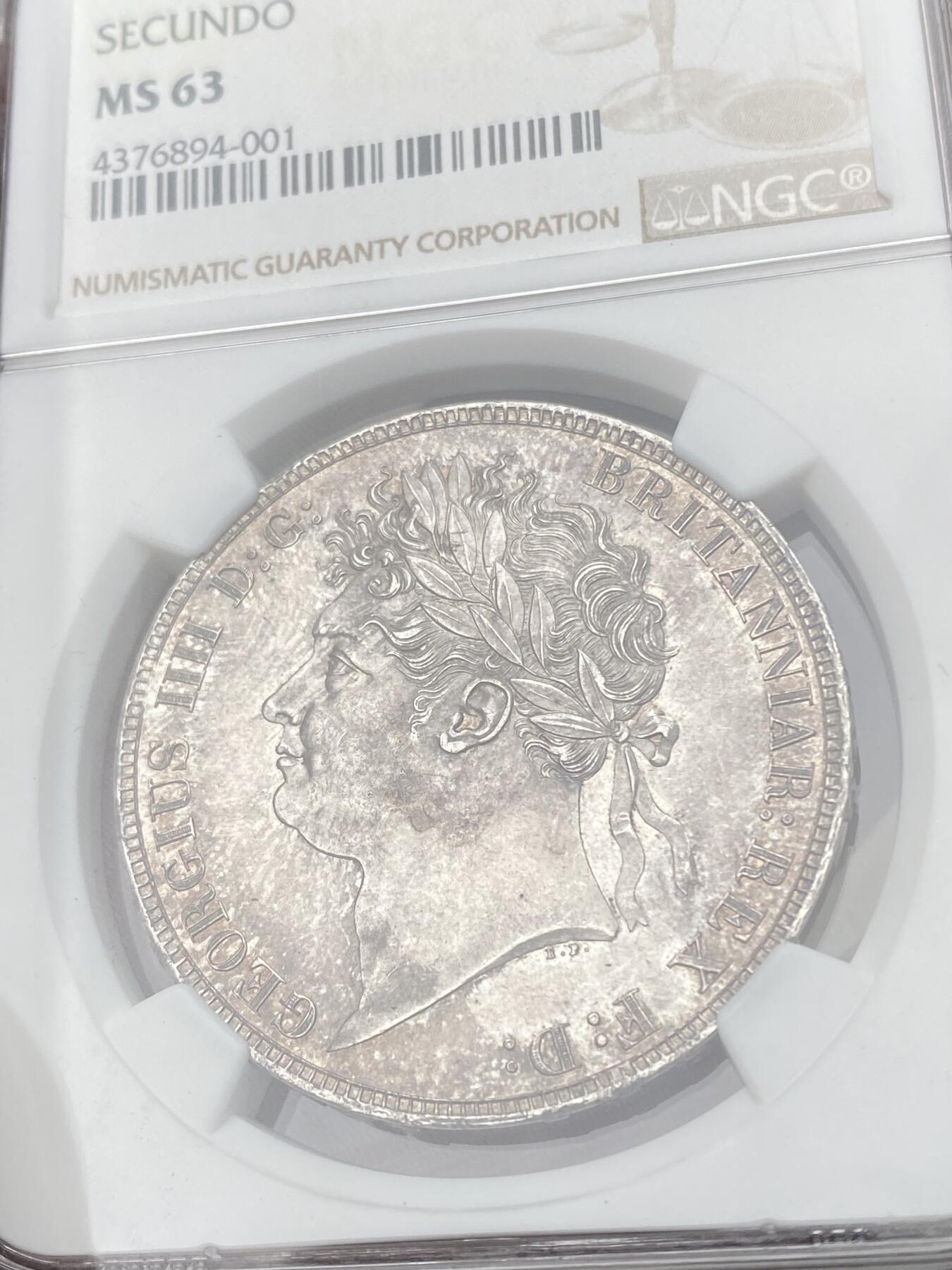 万国钱币拍卖第051期 NGC MS63 1821英国乔治四世马剑克朗 英国马剑系列中不可或缺的力作 Pistrucci倾力之作 优雅铁灰包浆 车轮转光 好品难得的一枚马剑大银