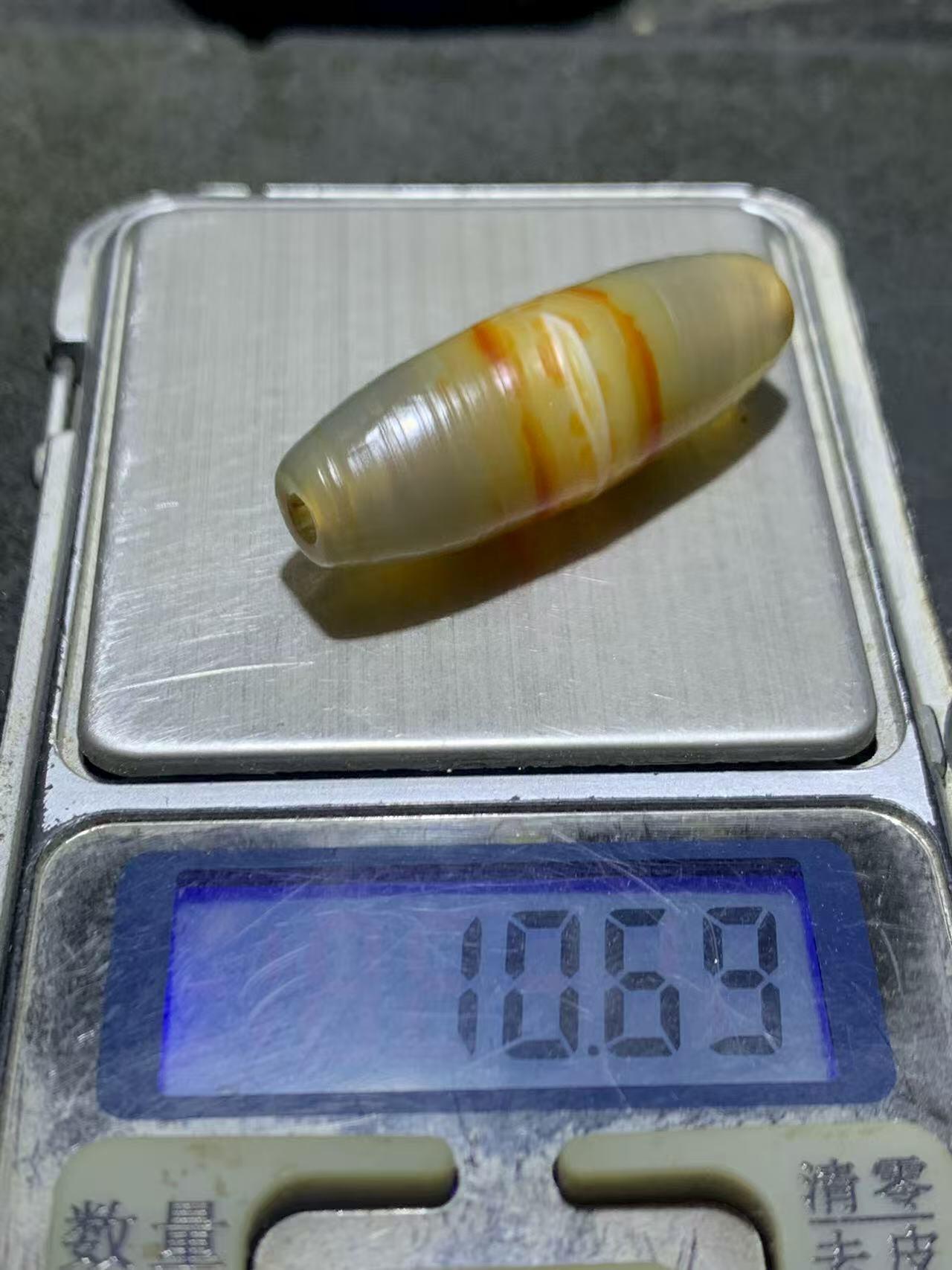 精美高玉化风化纹一线天眼千层纹缠丝玛瑙随形桶珠一颗