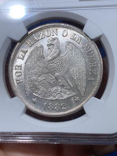 《竞宝斋》第410场 周日，周一，2场连拍 （全场包邮） NGC MS63 智利1882年秃鹰大银币，智利和英国硝石战争结束前一年的出品，智利在经济困境中任然制作出如此高品质的银币非常不易。