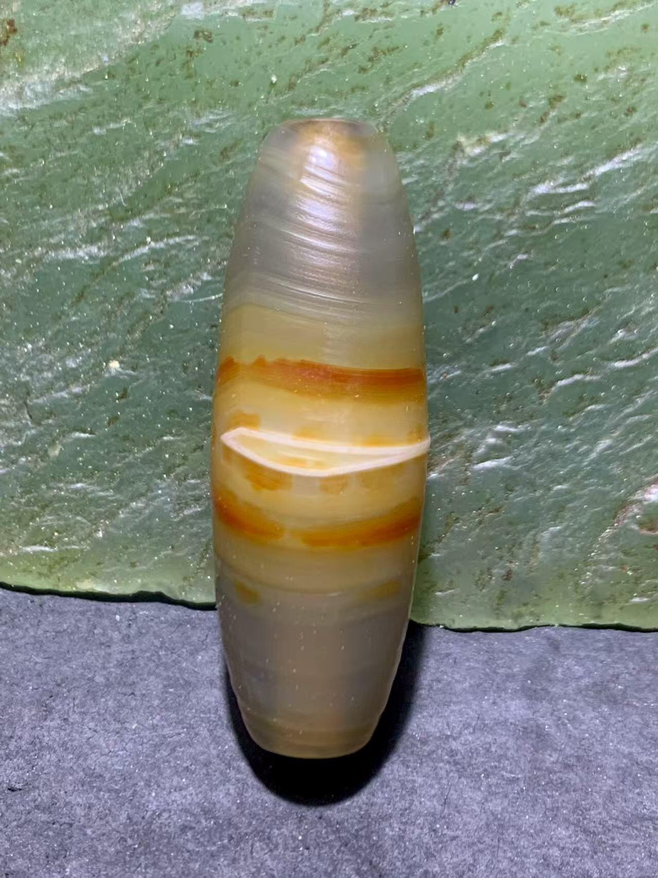 精美高玉化风化纹一线天眼千层纹缠丝玛瑙随形桶珠一颗