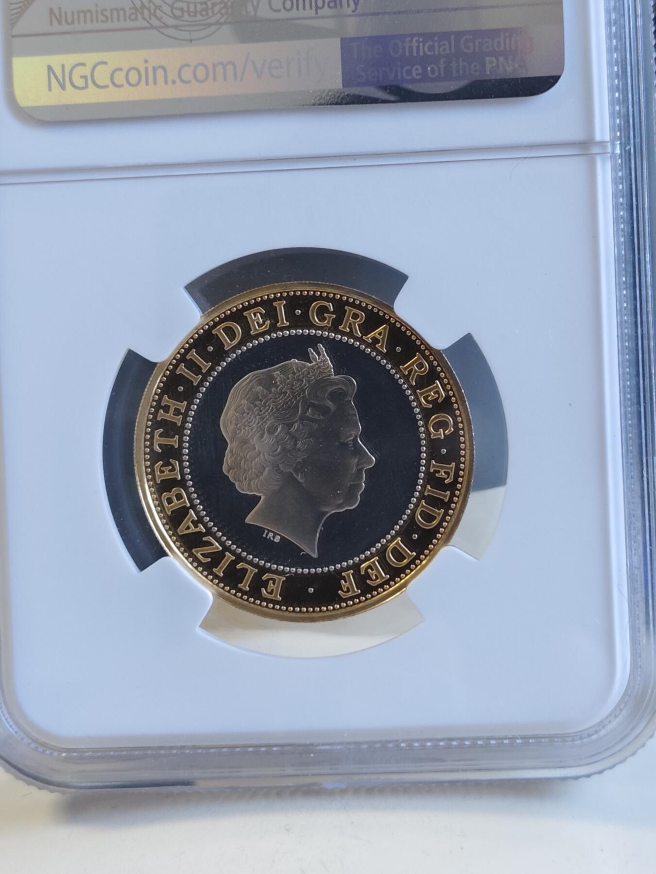 第171期拍卖【长期征集拍品】 英国1999年2镑精制双色银币 橄榄球世界杯 12克925银 外圈镀金 发行量：约1万枚 NGC PF67 UC