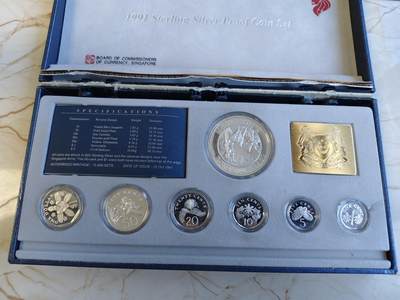 第171期拍卖【长期征集拍品】 - 新加坡1991年精制银币套 1分，5分，10分，20分，50分，1元，5元（全民防御）1万5千套 盒证全 盒子有破损，个别有氧化