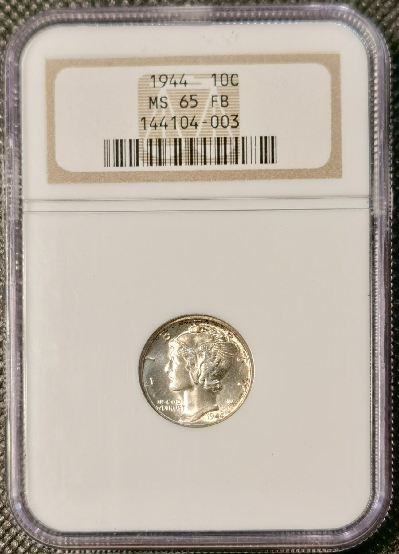 甄臻铺-世界币章拍卖（第30期），送拍享返佣金等优惠多多 NGC-MS65FB 1944年美国小飞侠，金色包浆，少见FB后缀