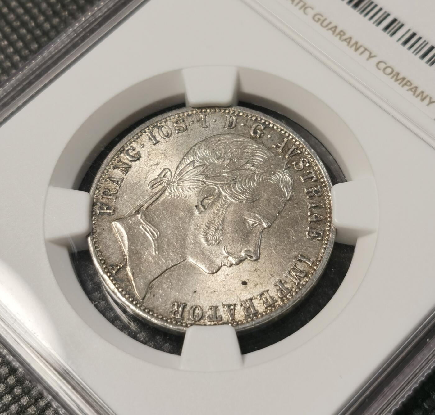 甄臻铺-世界币章拍卖（第30期），送拍享返佣金等优惠多多 NGC -MS63 1861年奥地利帝国弗朗茨一世1福林