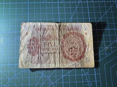 【炜奕收藏】，第四十二期 1943年英国第一版5先令军票，流通品相